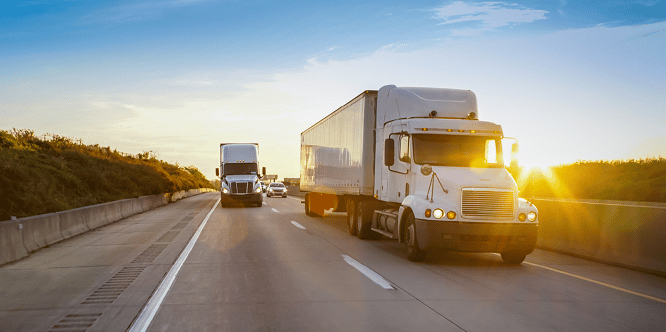 Semi-truck transporting goods on highway